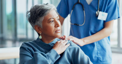 Femal patient with healthcare provider Getty Images 1706101840