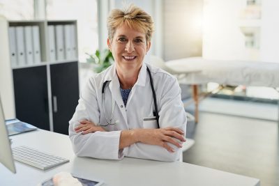 Doctor at desk Getty Images 1134258385