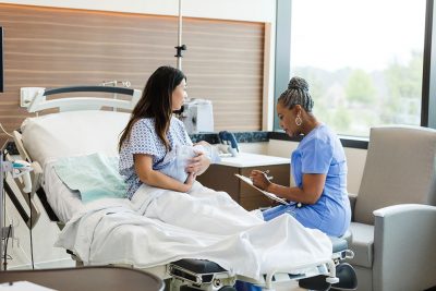 New mother and nurse in hospital Getty Images 1531588690