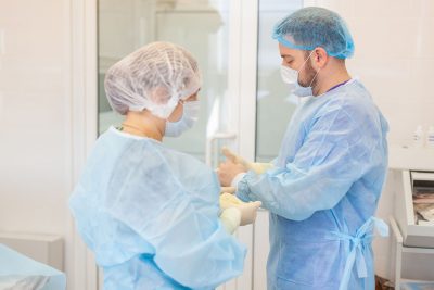 Healthcare workers in gowns Getty Images 1204966534