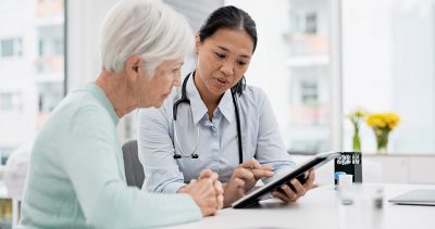 Older woman with physician Getty Images 1650853747