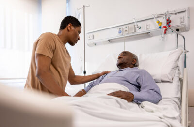 Son and father in hospital Getty Images 1442374664