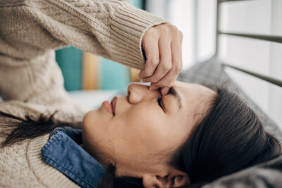 Woman with migraine Getty Images 1453153745