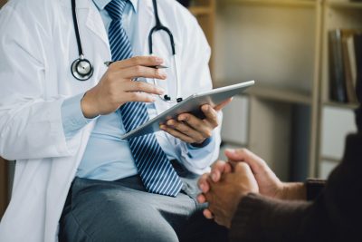 Physician and patient Getty Images 1406496671