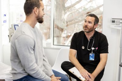 Male doctor wtih male patient Getty Images 2130880406